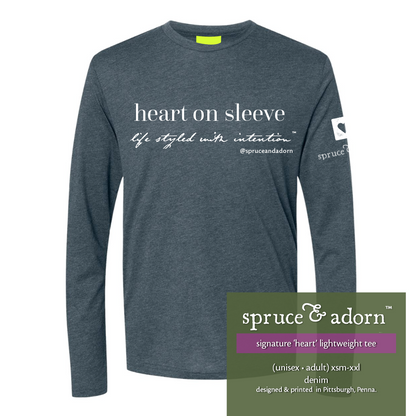 appalachia green description box, overlying indigo colored signature ‘heart on sleeve’ long sleeve fleece tee reading : ‘heart’ long sleeve tee (unisex • adult) xsm-xxl indigo with our logo and a heart on the right arm patch