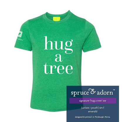 navy description box, overlying emerald colored signature ‘hug a tree’ @spruceandadorn t-shirt reading : ‘hug a tree’ tee’ (unisex • youth) sm–l, emerald; designed & printed in Pittsburgh, Penna.